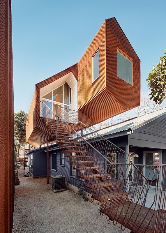 Outdoor steps lead to bungalow addition