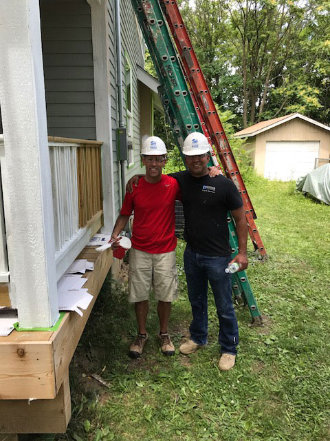 Windsor team on newly painted home porch