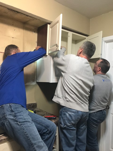 Installing kitchen cabinets