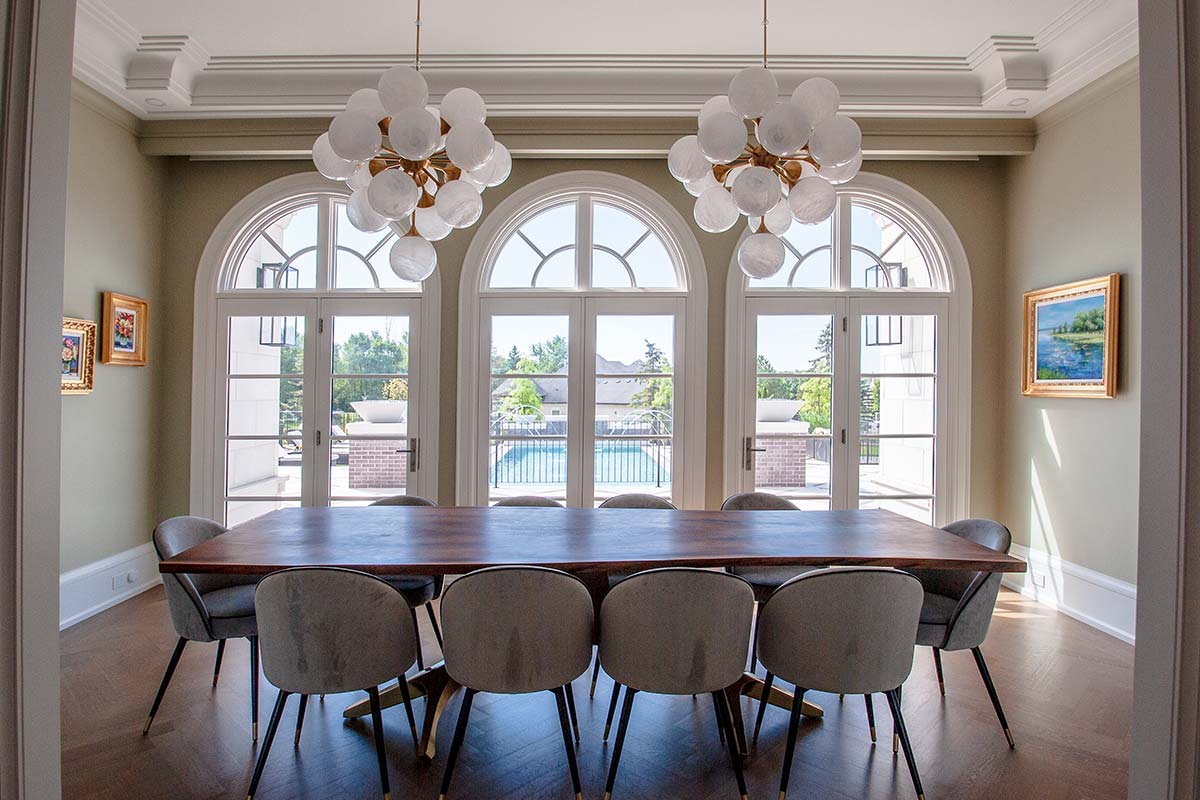 Gorgeous swinging patio doors with arched transoms